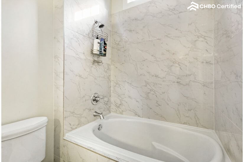 Large marble tub and shower for bedrooms 1 an