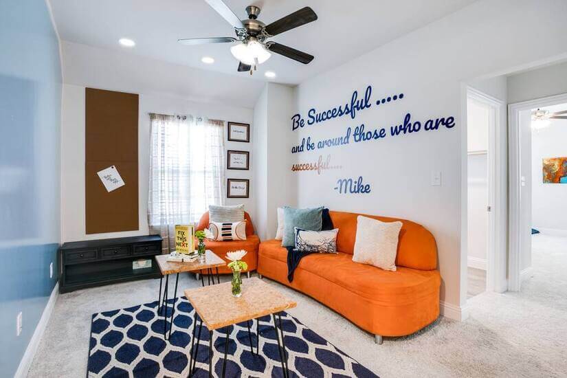 upstairs living room w/ dry erase board wall