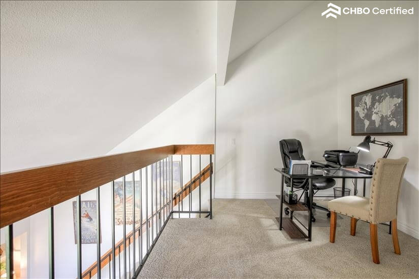 Loft area with working office and air printer