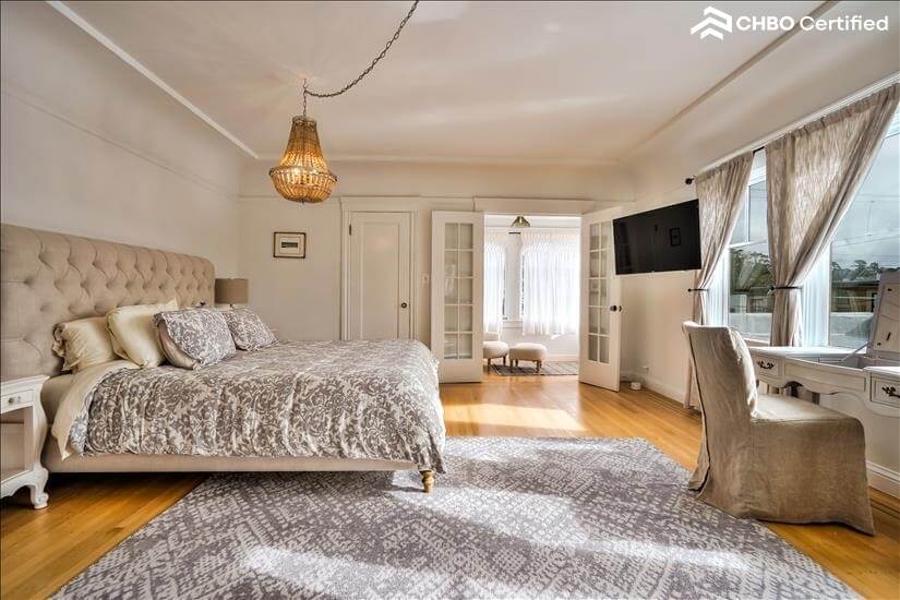 view of sun room in king bedroom