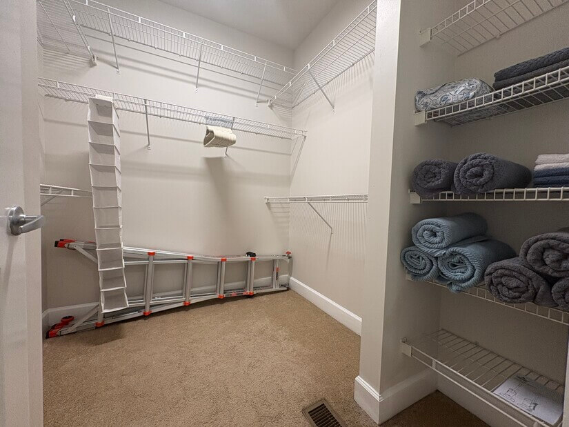 Walk in Closet with shelves for linens