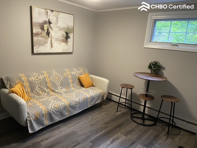 Futon couch seating oppsite fireplace