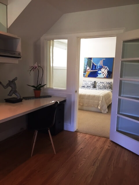 Entrance to bedroom with built in work area