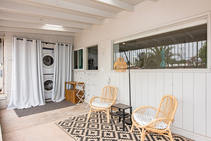 covered patio seating area, washer/dryer