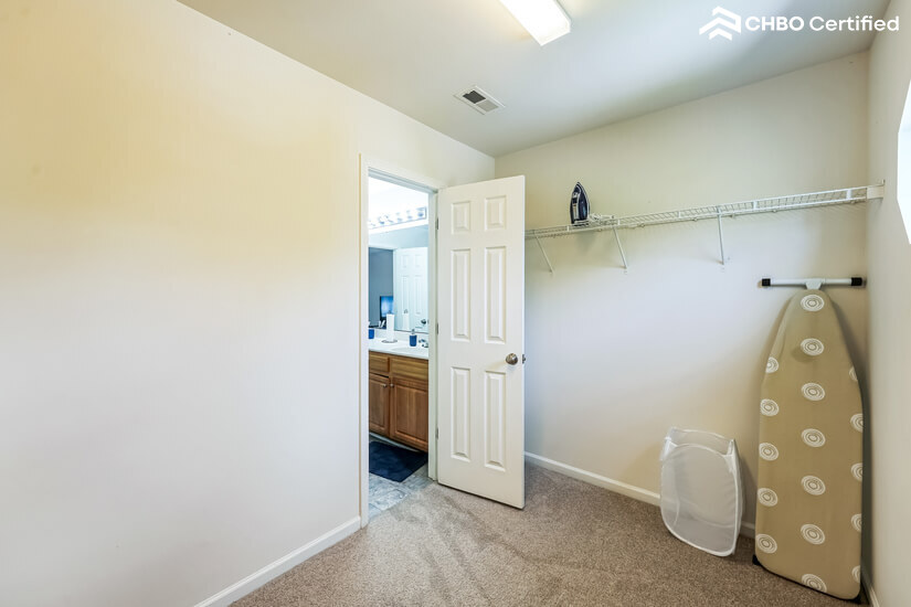 Primary bedroom large walk in closet .
