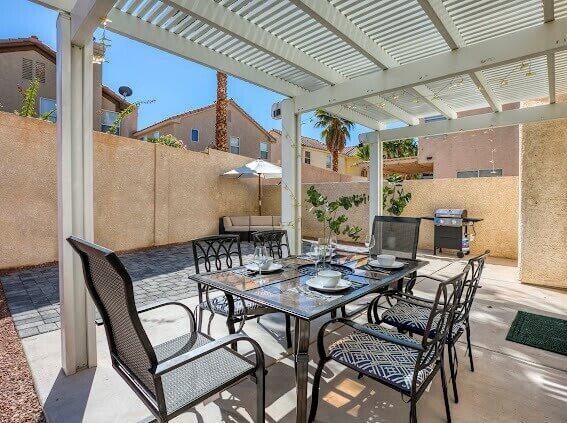 Back yard patio with grill and dining set