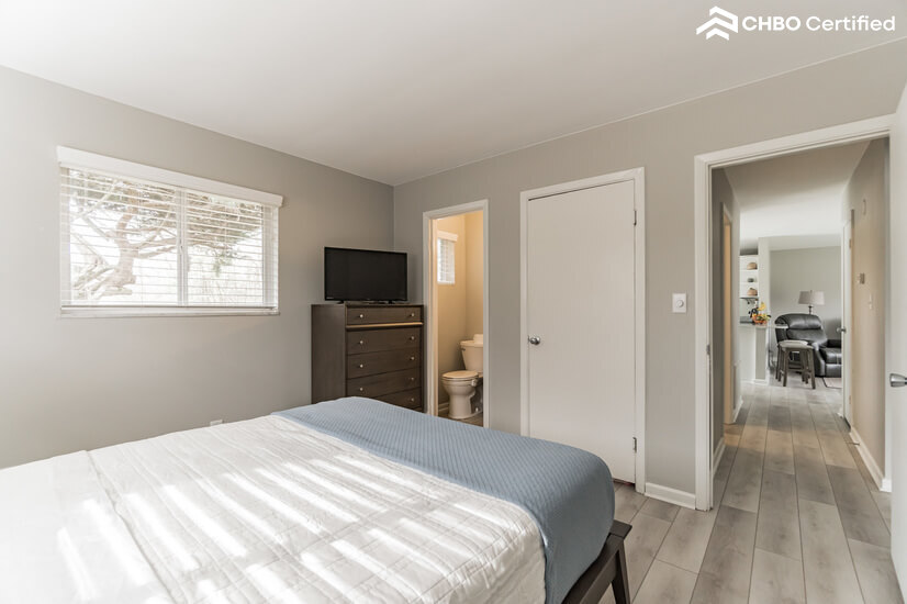 BR2 1/2 bath and view of hall leading to Living room.