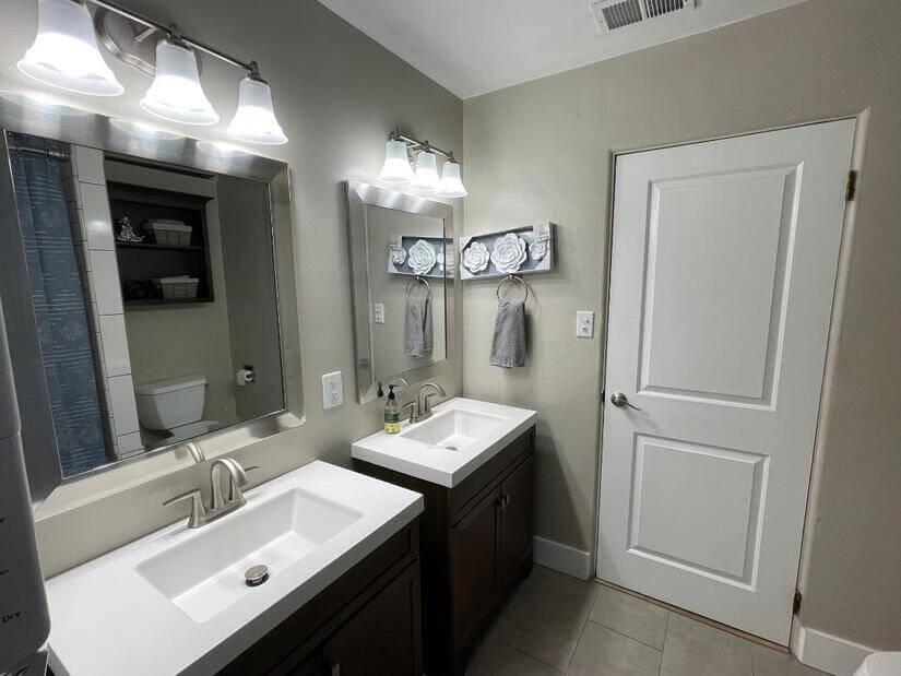 Bathroom with double vanities.