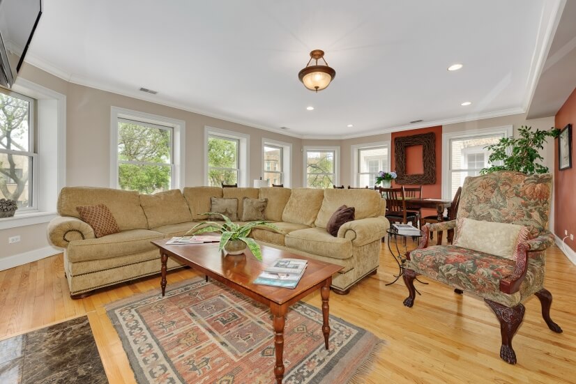 Open floor plan with a fireplace and gourmet