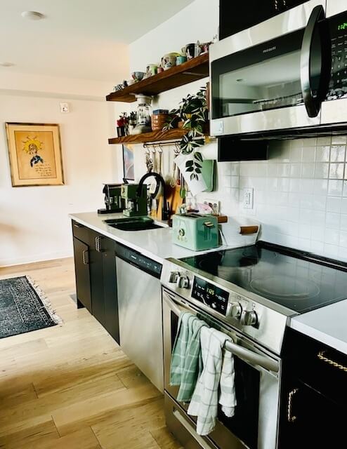 New, stainless steel appliances in the kitchen