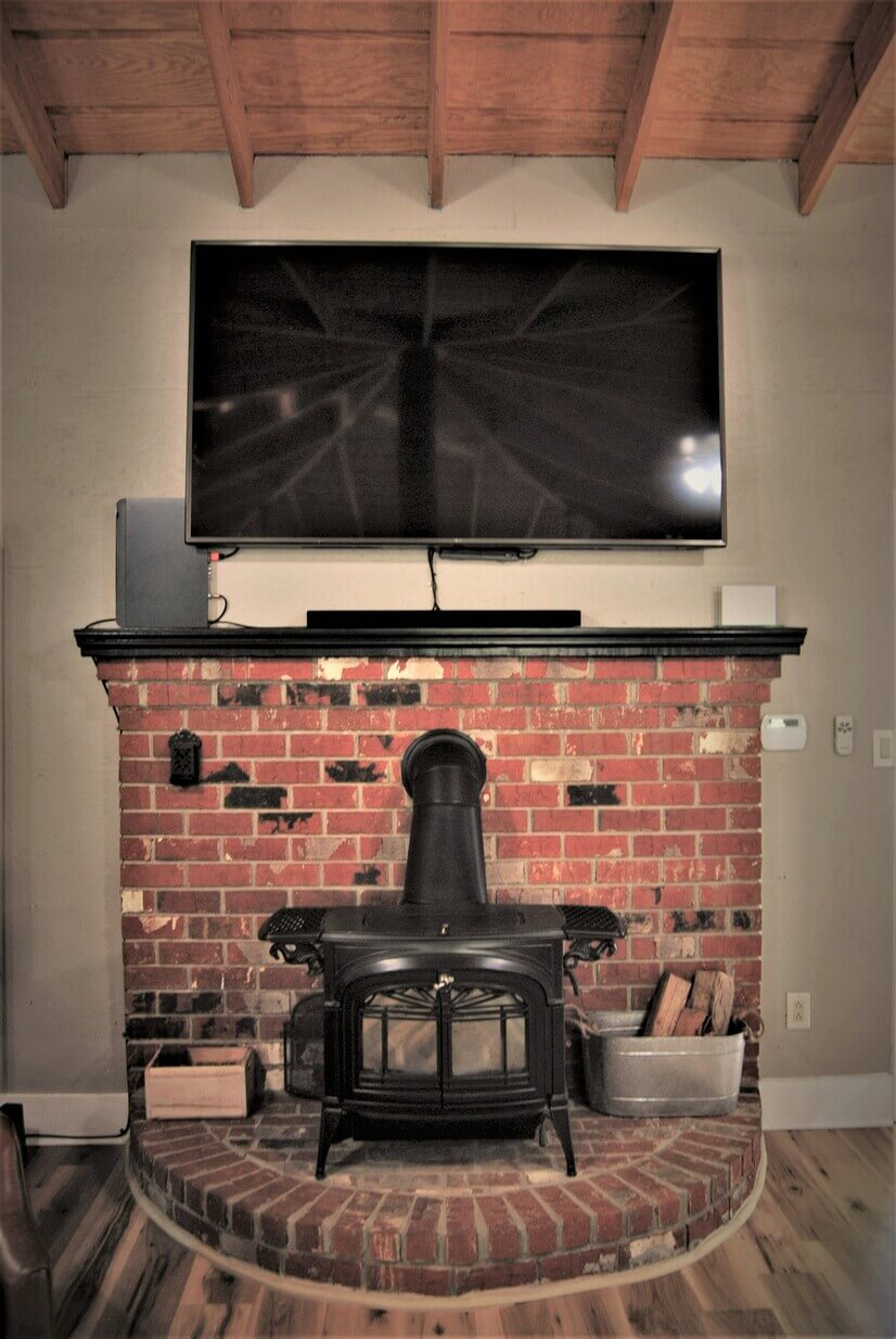 75" Smart TV above stove f/p perfect for watching movies