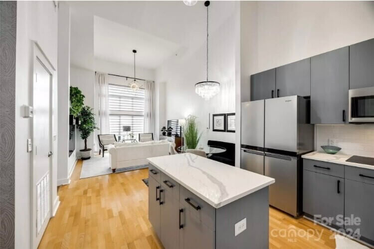 New Overhead lighting and large windows