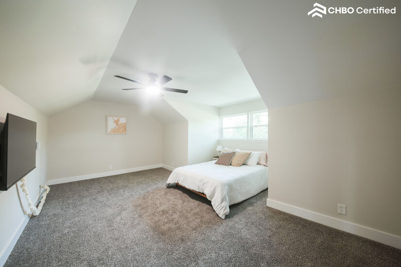 Bedroom with queen bed, smart TV