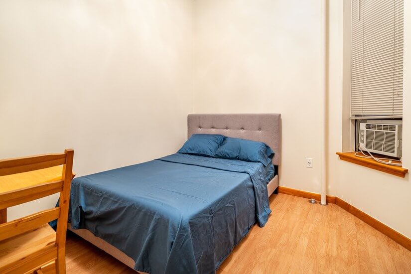 The furnished bedroom is $2,400/month