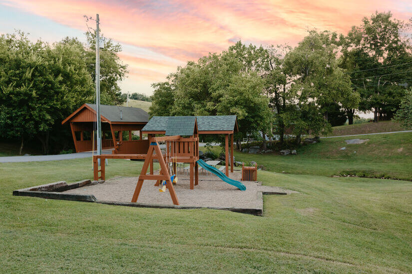 Shared playground - located opposite cabin