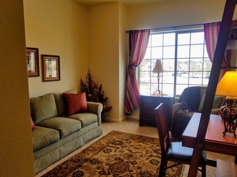 Beautiful den with comfy sofa bed, reading ch