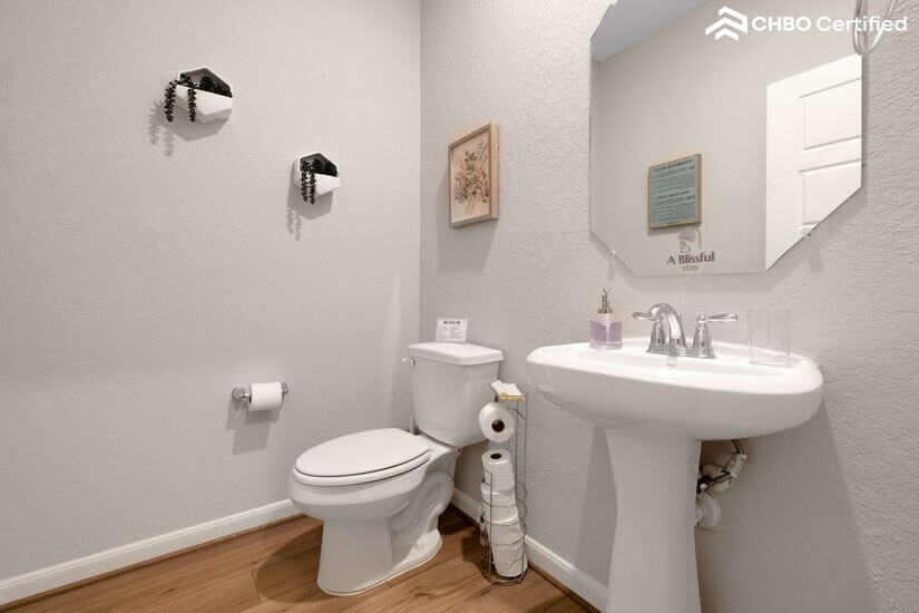 Shared half bath by office on first floor.