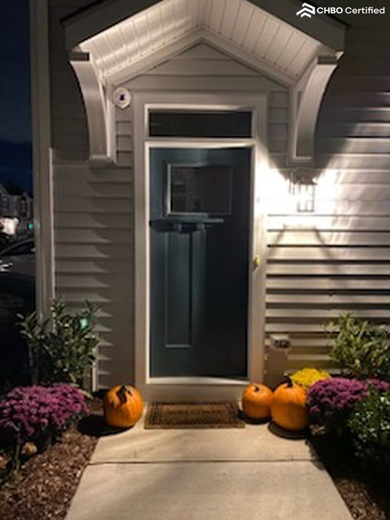 Front door of home in the evening during fall
