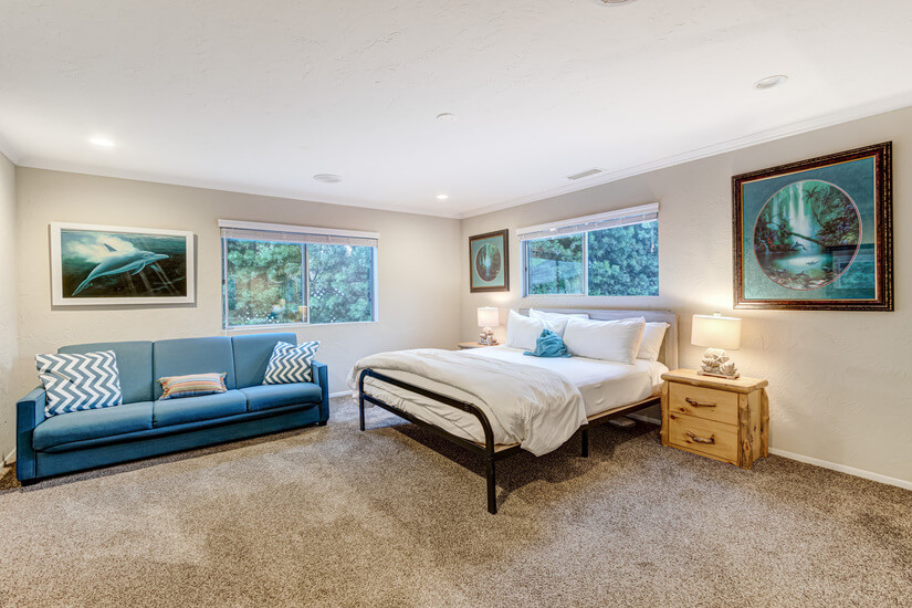 Bed 2- King bed, futon couch, TV, luxury linens