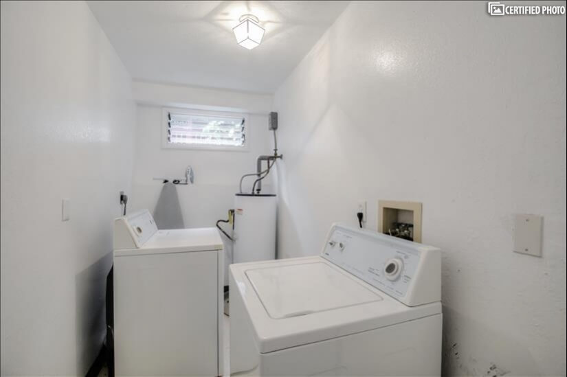 Utility room with washer and dryer