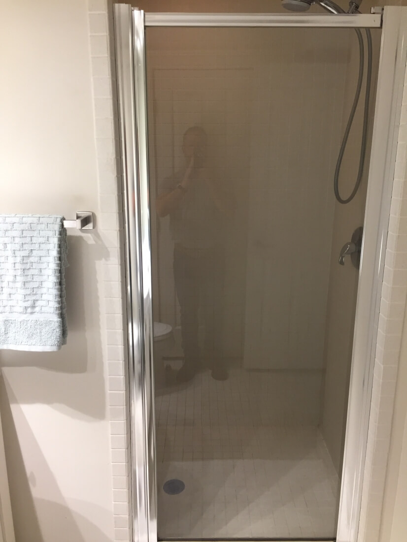 Large tiled shower with bench
