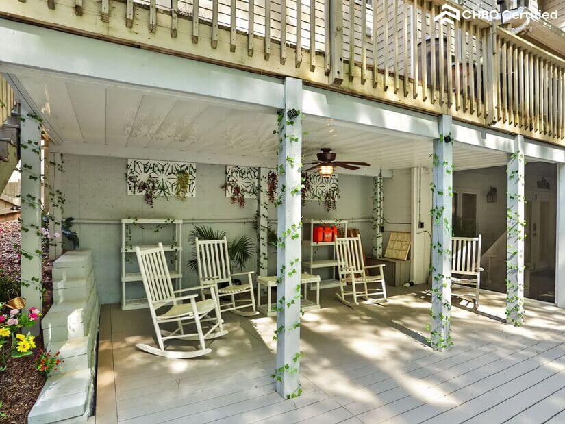Rocking chairs w/ceiling fan, lighting, & game stored