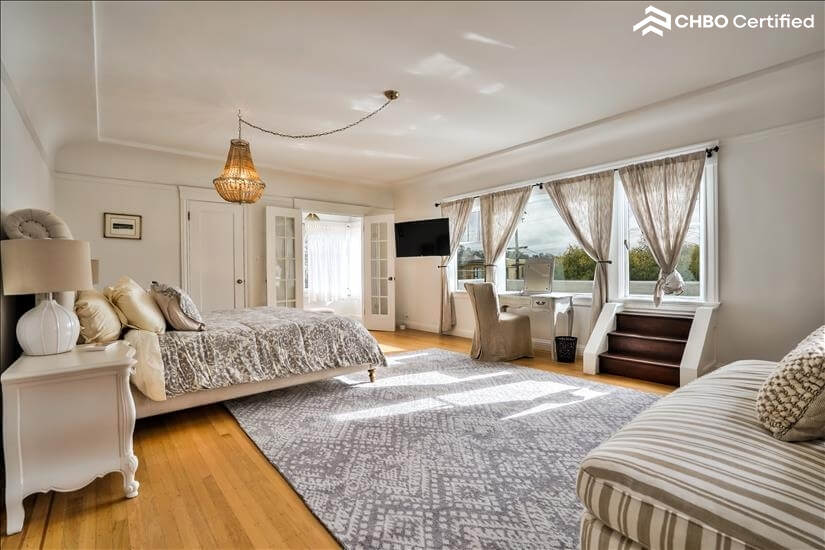 Master king bedroom view, 2 walk-in closets and sunroom.
