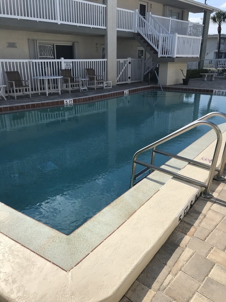 Swimming pool with grilling station