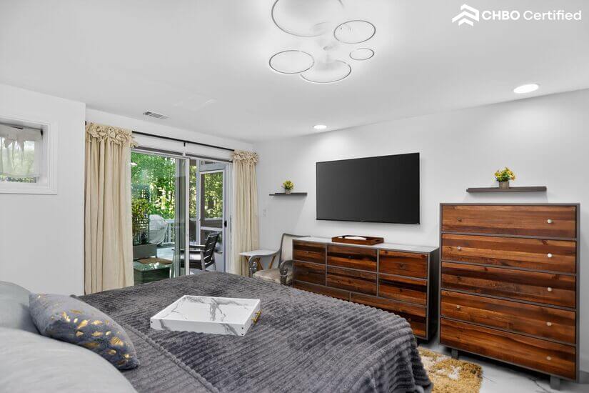 Primary sliding door w/ garden view.