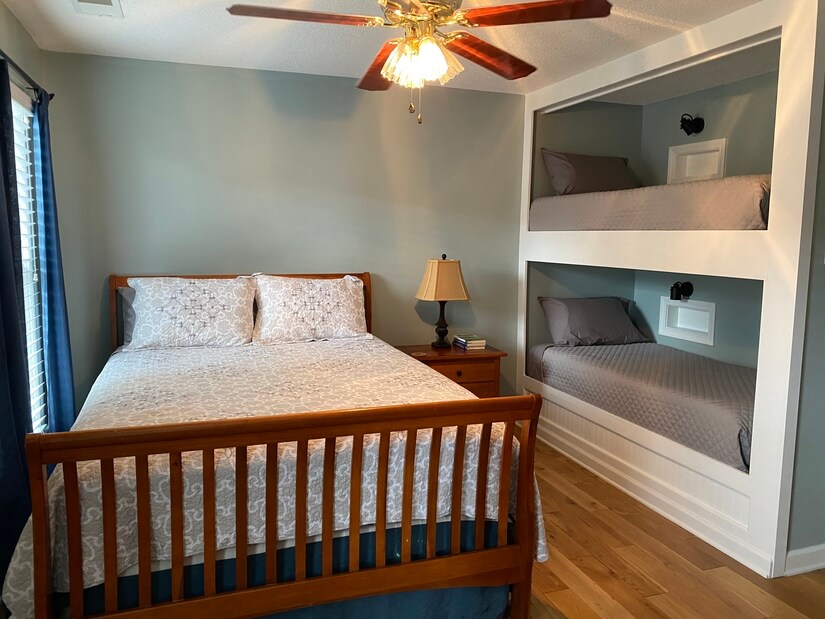 Queen bed and cozy built in bunk beds