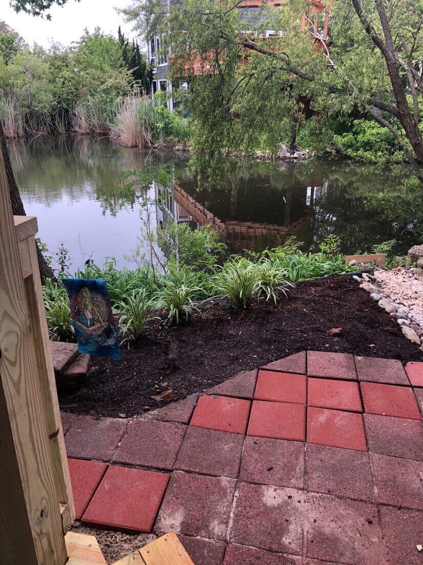 Patio by pond