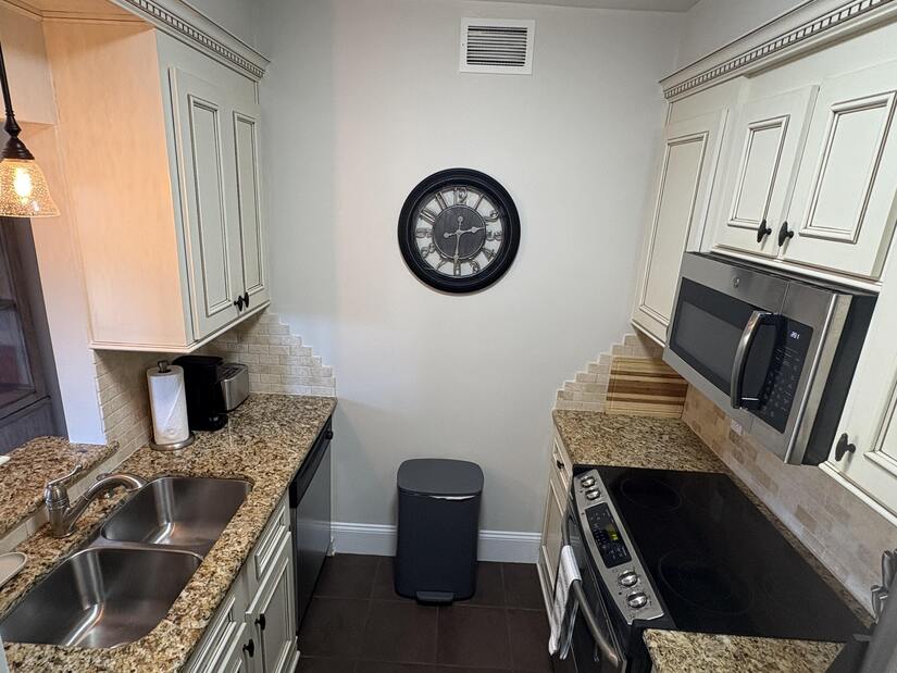 Brightly lit with large cabinets