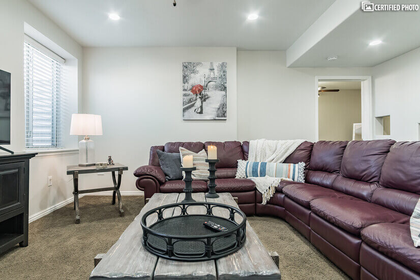 Plenty of comfortable seating in this beautiful Living Room.