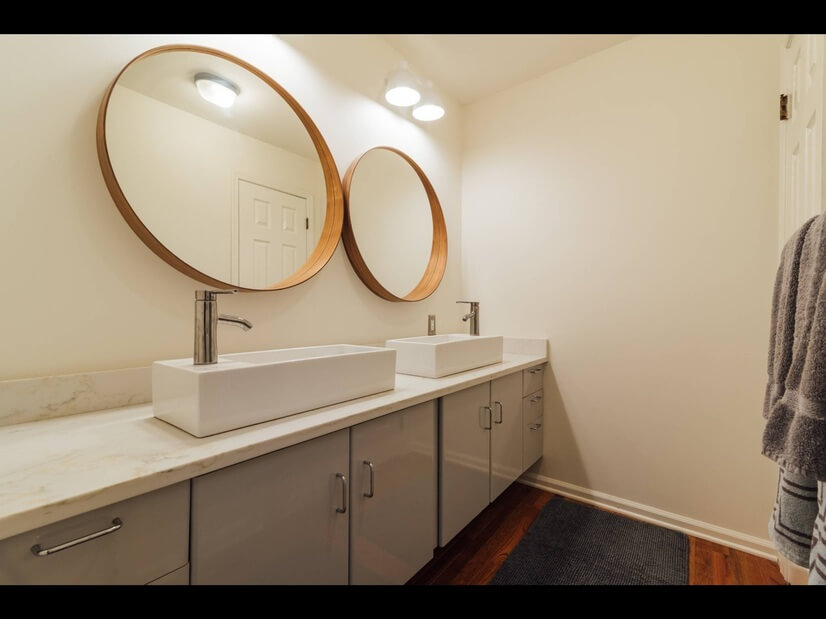 Double vanity separate from toilet and shower