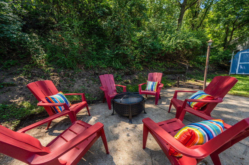 Hang out on Adirondack chairs around the firepit.