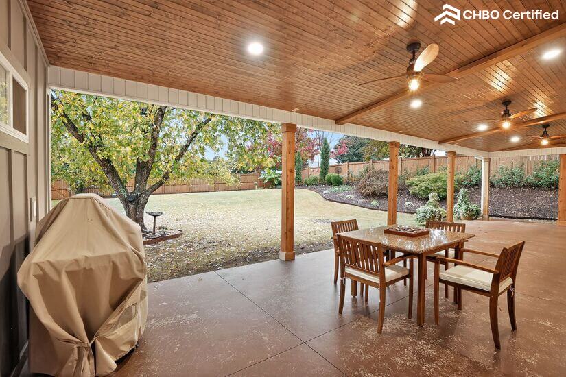 Covered Patio with BBQ Grill and Seating Area
