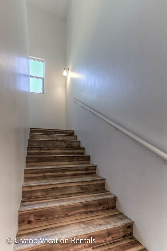 Stairs leading to 2 Master Bedroom