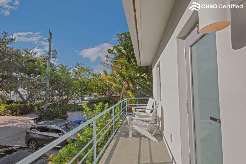 Entrance with  balcony and outdoor seating