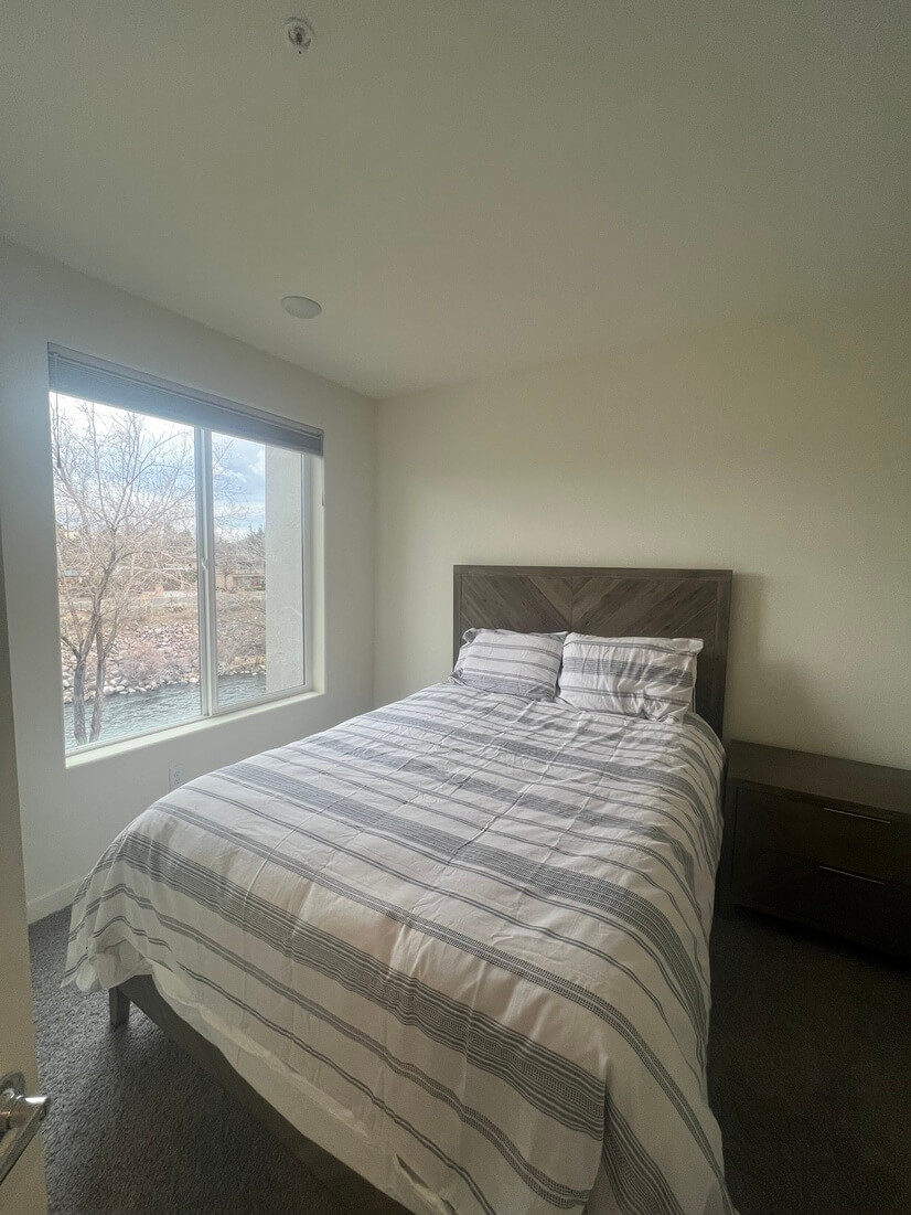 Guest bedroom with a riverview