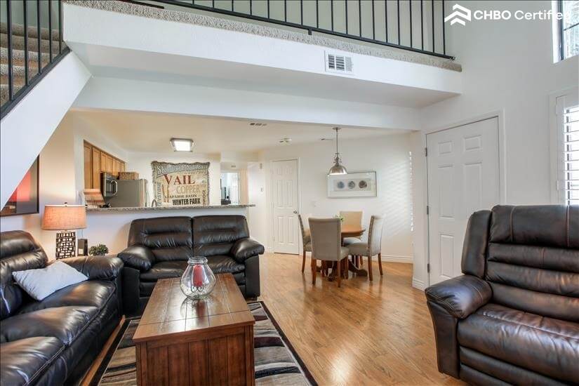 Living room with loft above