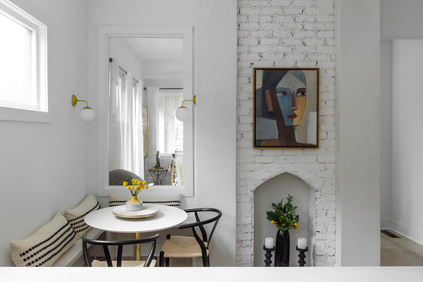 Sunny breakfast nook with artful seating