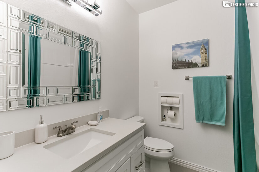 Modern guest bathroom with lots of updates and storage
