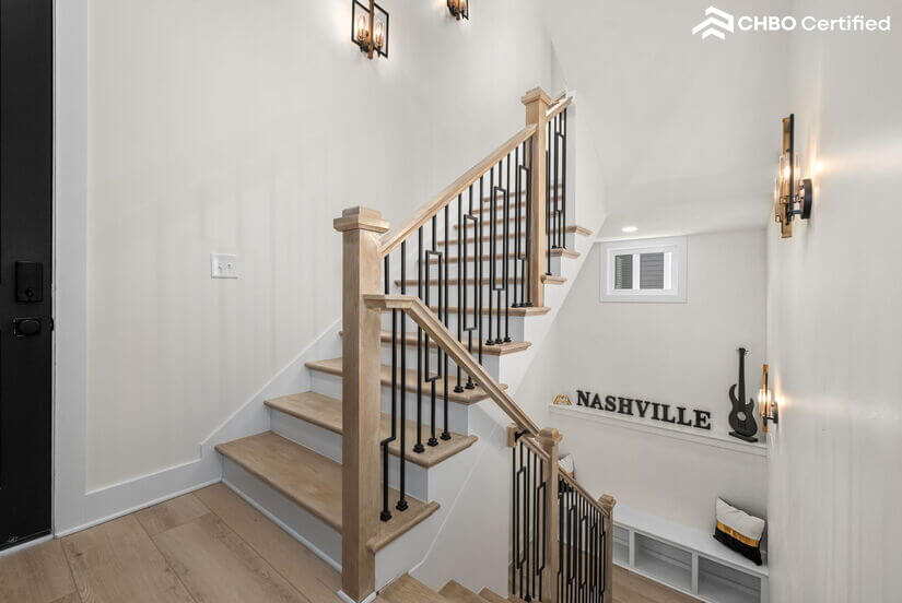 Sophisticated staircase & landing w/seating and storage.