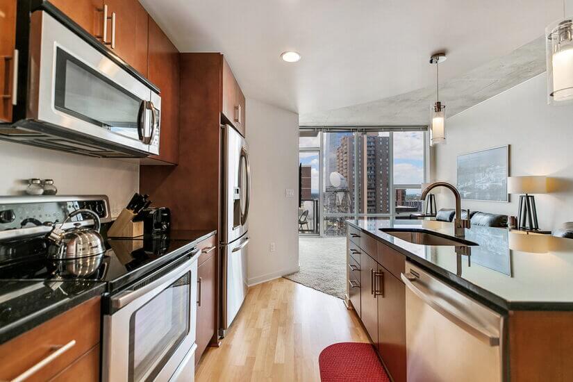 25th Floor Spire Condo Plus Den