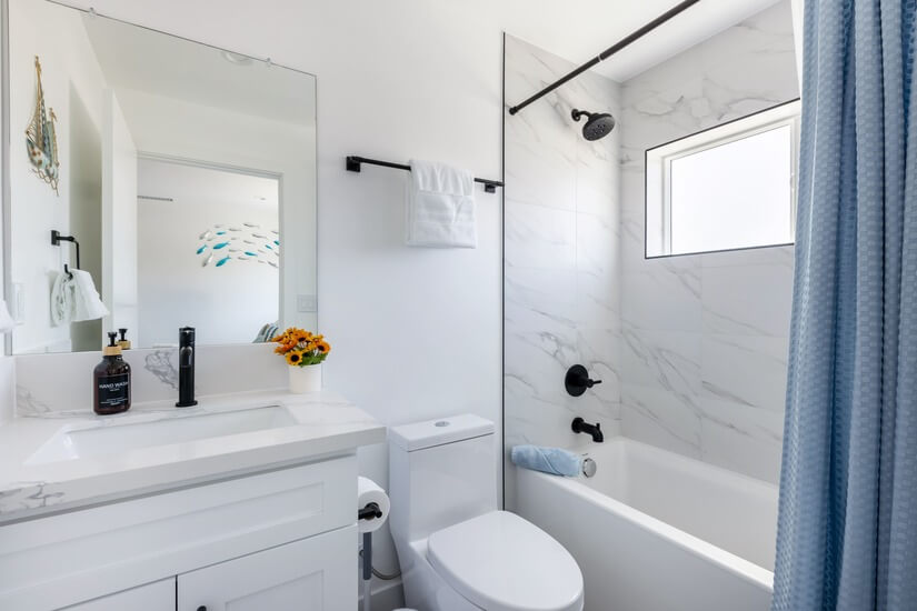 bathroom 1 connected to bed.