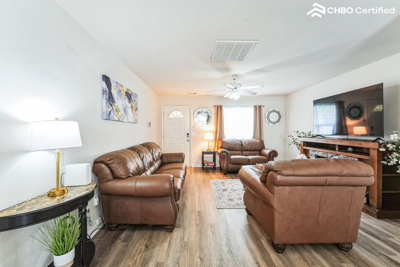 Comfy couch and 65 inch TV