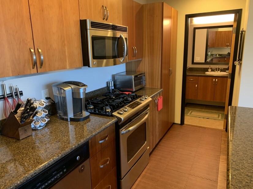 Kitchen and Entrance to Guest Bathroom