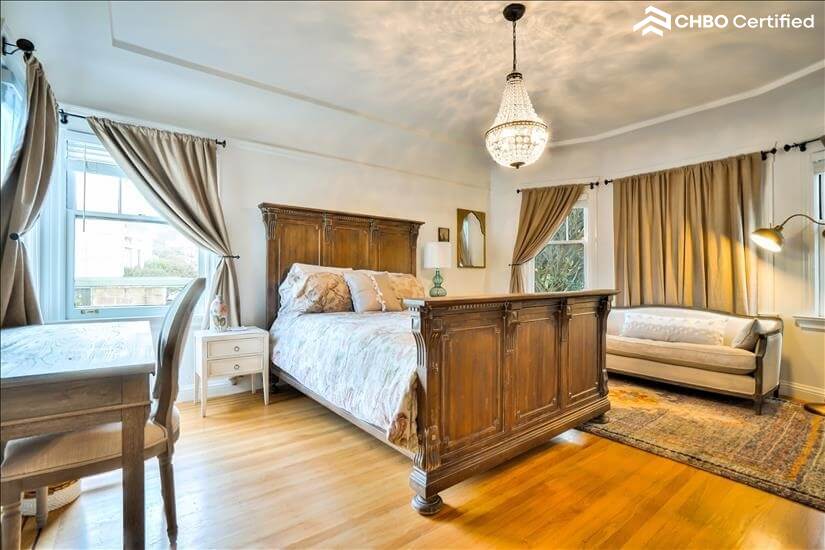 Bedroom 1 with queen bed and 2 walk-in closets