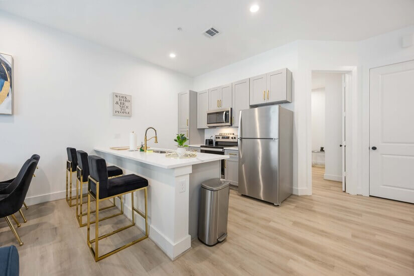 Additional seating on island with 3 barstools