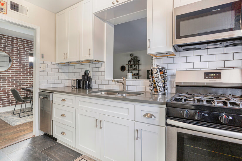 Galley Kitchen with view of Living Area